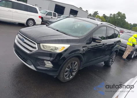 2017 Ford Escape Titanium z USA, uszkodzony, nr VIN 1FMCU0JD9HUA27054